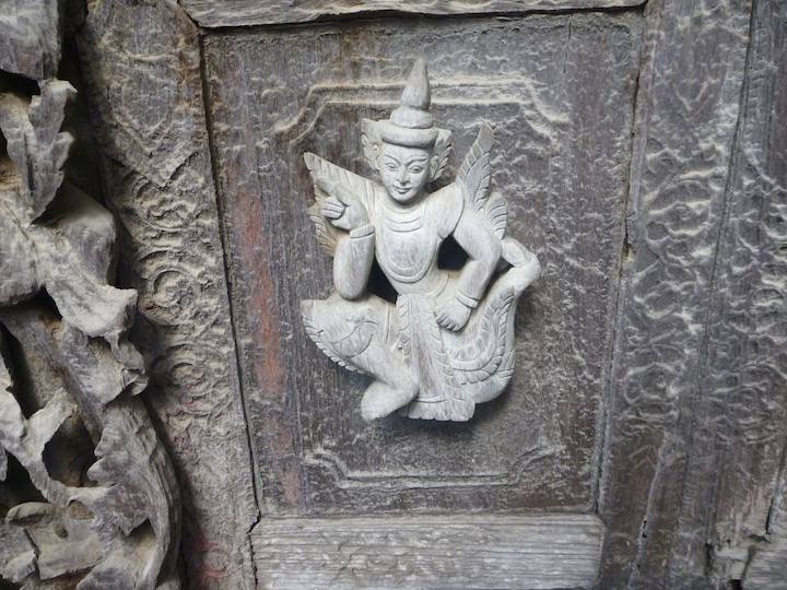 detail of wall panel carving at  Shwenandaw Kyaung